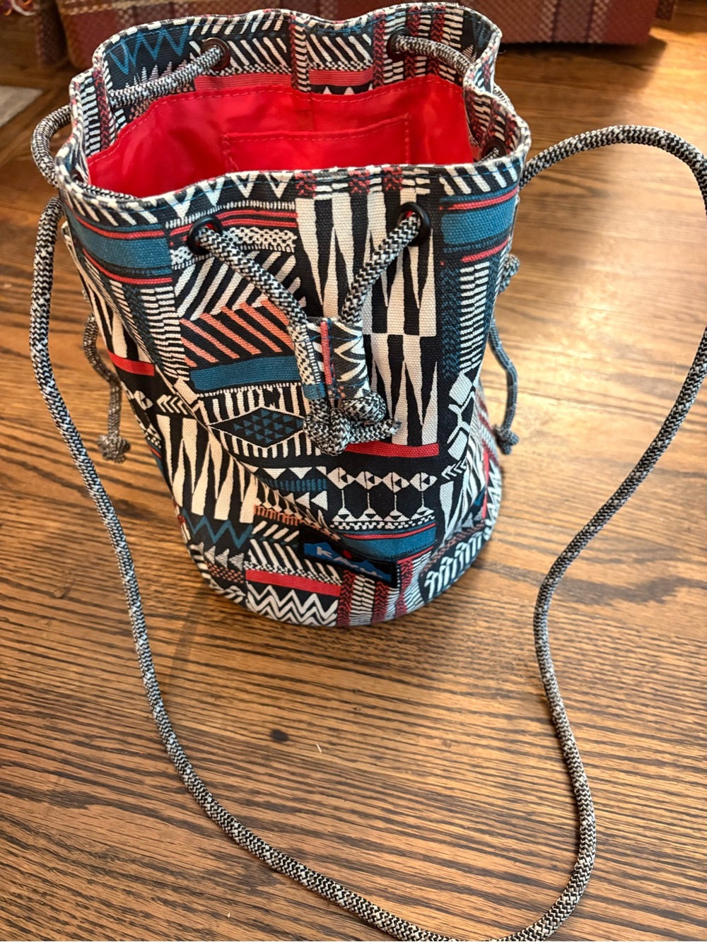 Kavu Geometric Drawstring Crossbody in Blue, Red & Black